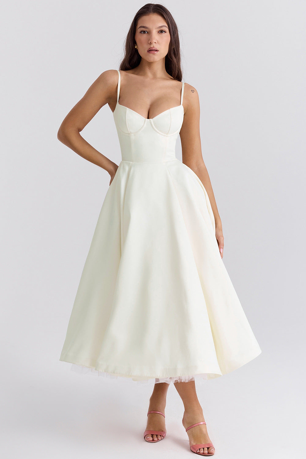 Cream bustier midi dress with thin straps and layered tulle high-low skirt