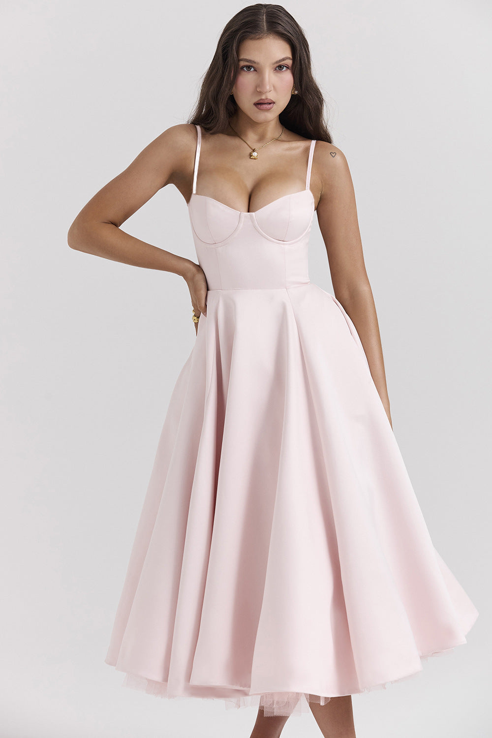 Blush pink bustier midi dress with thin straps and layered tulle high-low skirt