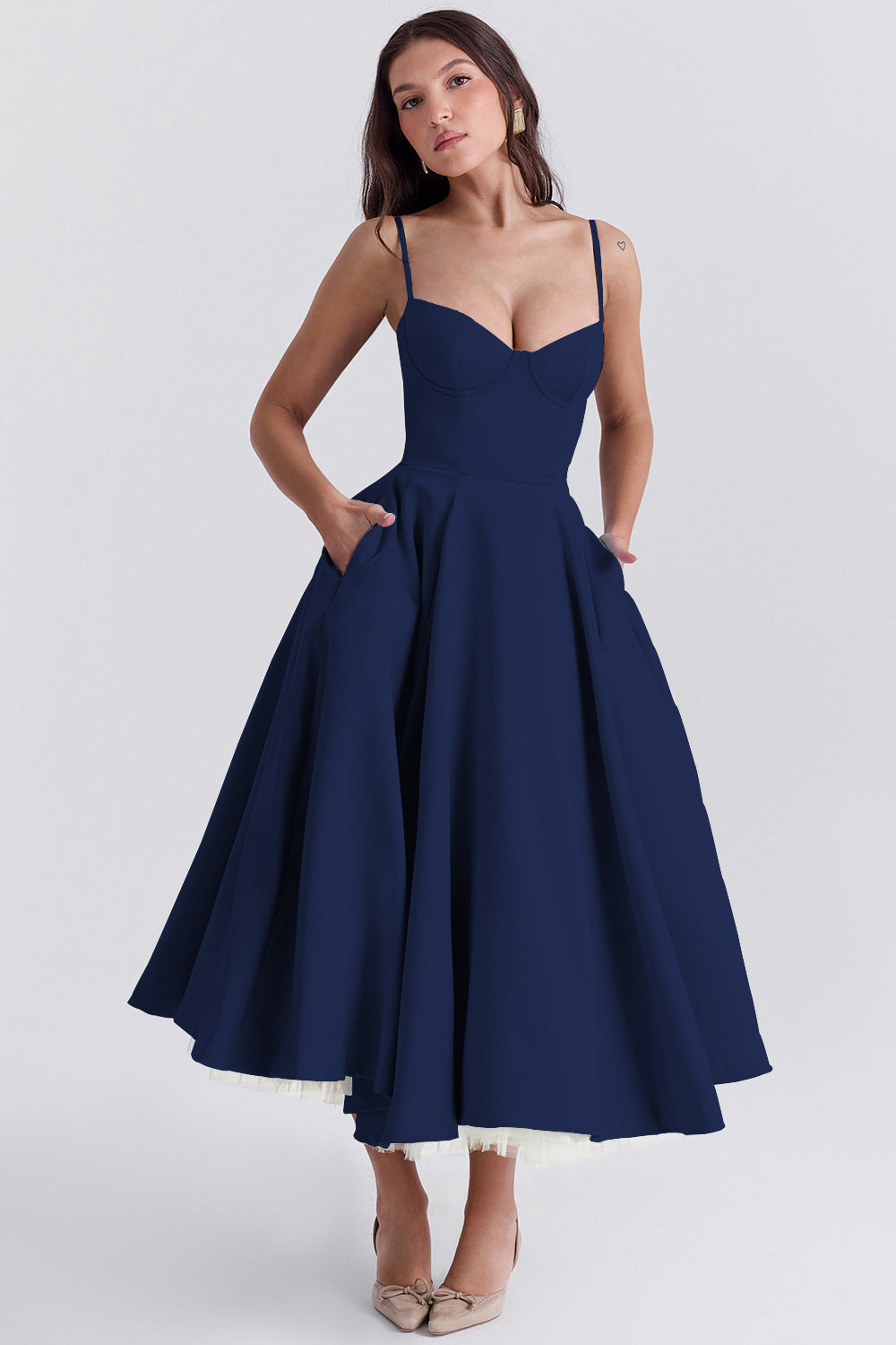 Navy blue bustier midi dress with thin straps and layered tulle high-low skirt