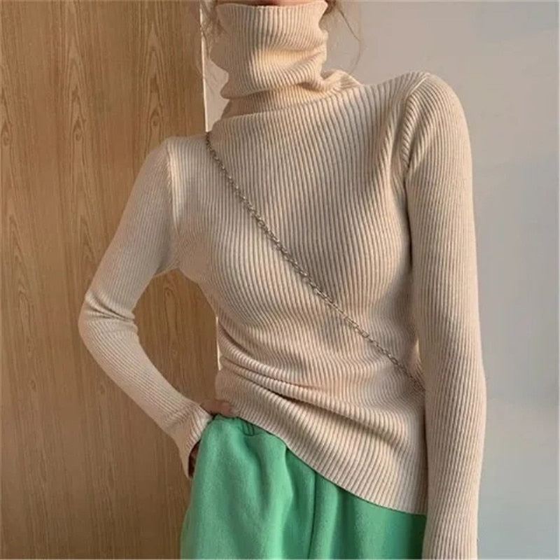 Women’s ribbed turtleneck sweater, cream/beige, long sleeves, slim stretch knit.
