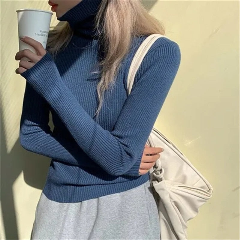 Women’s ribbed turtleneck sweater, medium blue, long sleeves, slim stretch knit.