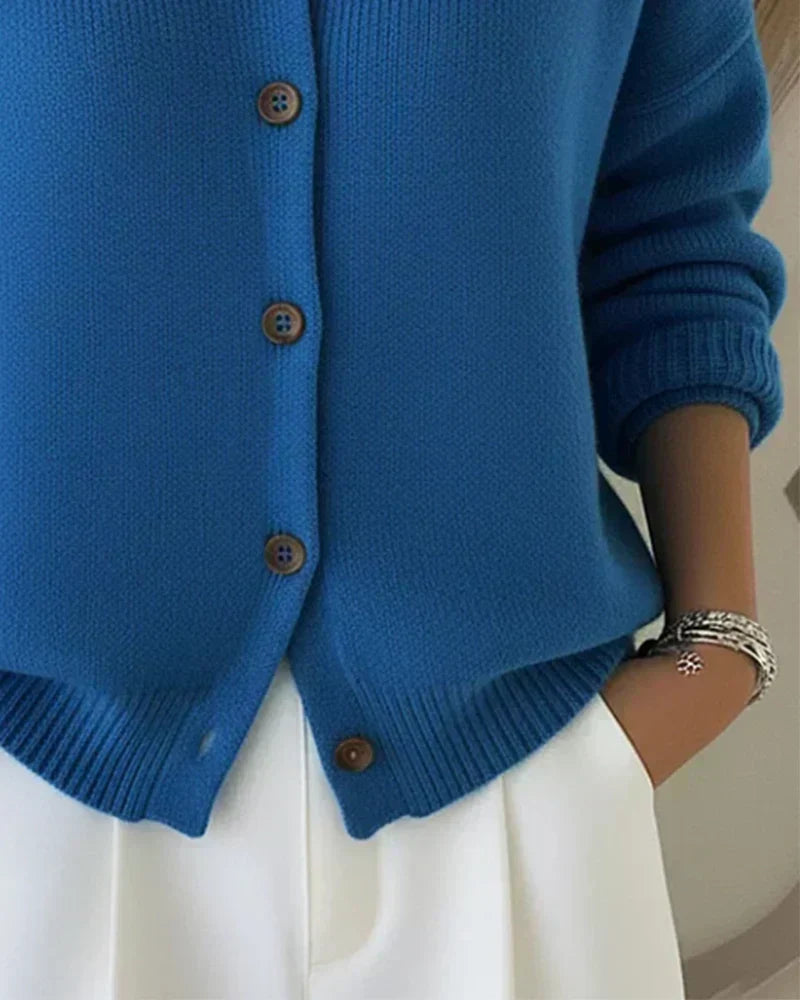 Blue cropped knit cardigan sweater with button placket and ribbed hem 1
