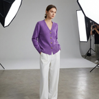 Purple V-neck button-front knit cardigan with gold heart buttons and ribbed hem cuffs
