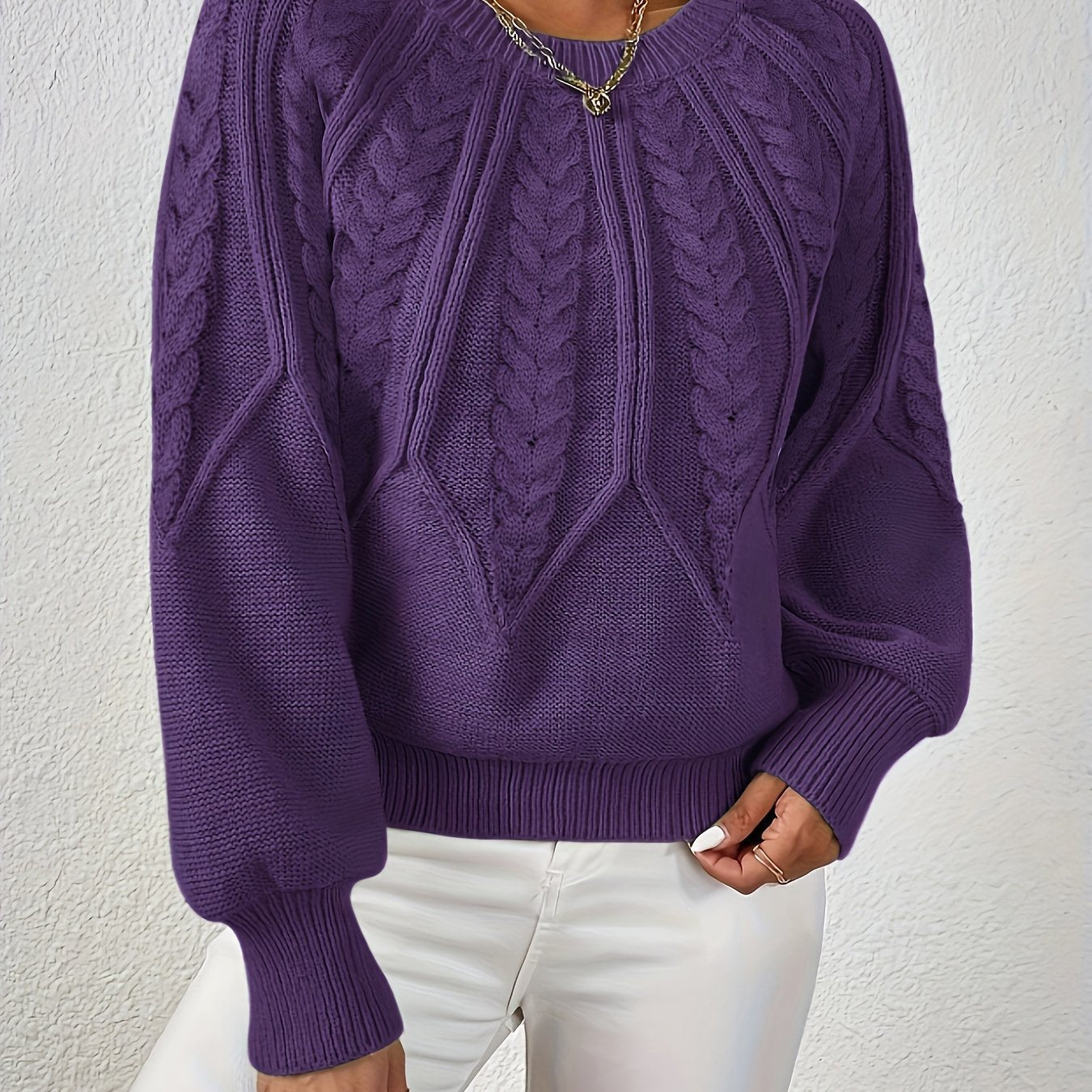 Dark purple cable knit sweater with voluminous sleeves, textured diamond pattern, zip neck