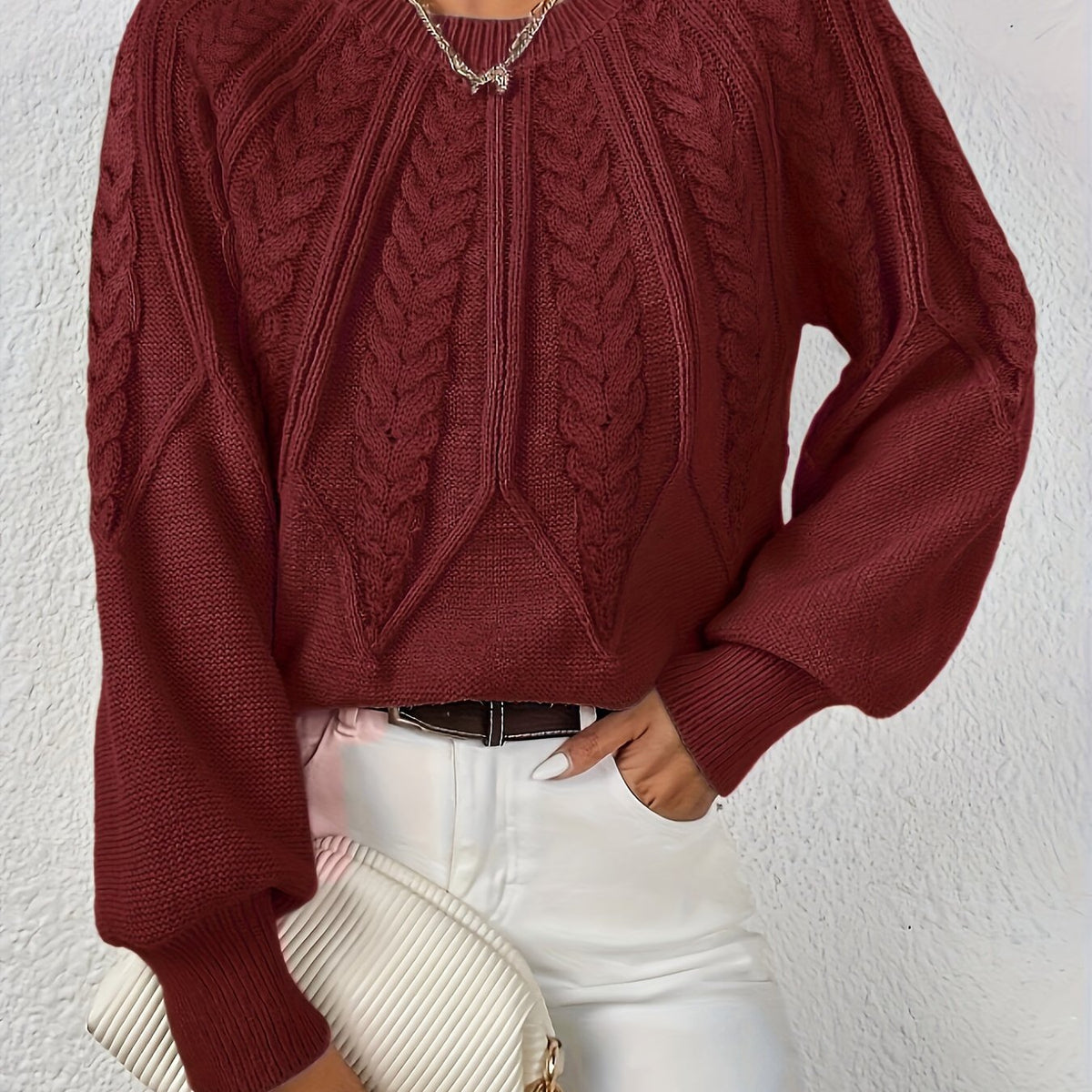 Wine red cable knit sweater with voluminous sleeves, textured cable diamond pattern, zip neck