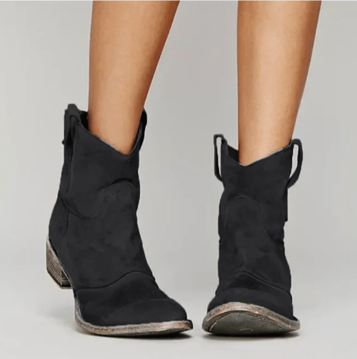Black suede western ankle boots with stacked block heel and pull tabs