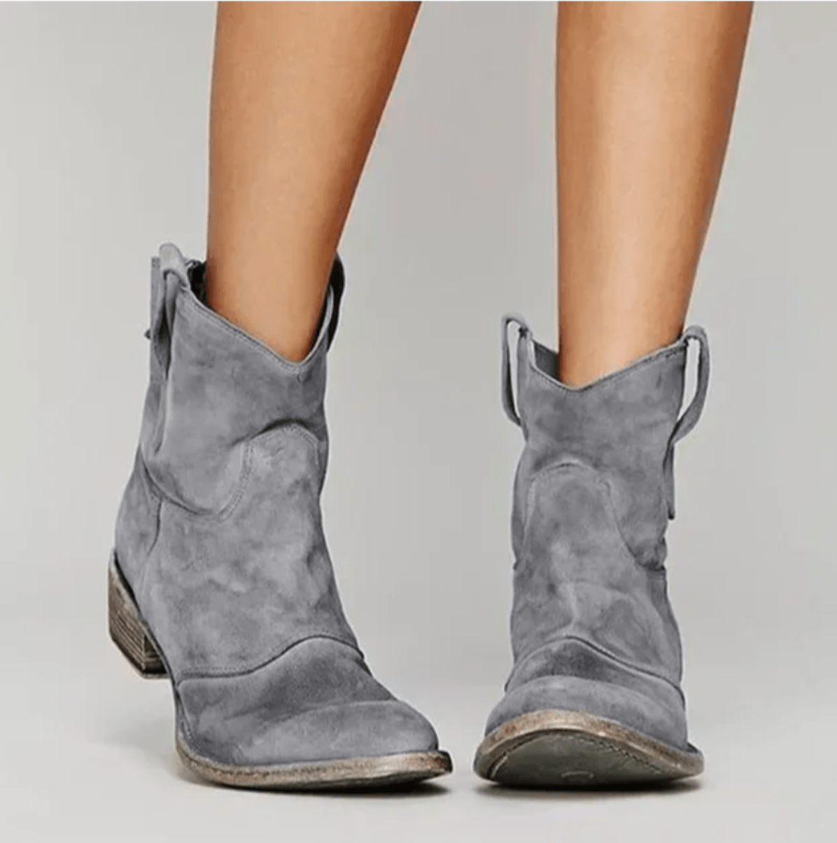 Grey suede western ankle boots with stacked block heel and pull tabs