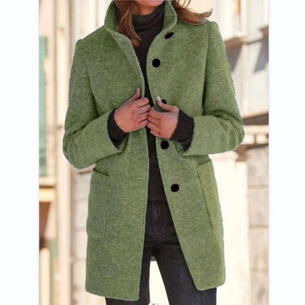 Women’s green stand-collar winter coat with button front and side pockets.