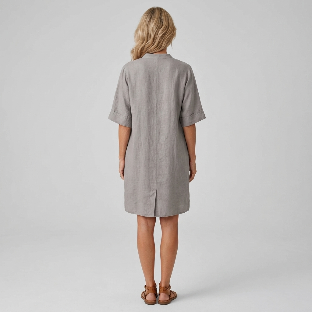 Grey shirt dress back view with button placket and relaxed midi length