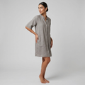 Grey shirt dress with button front, relaxed midi fit, and side pockets