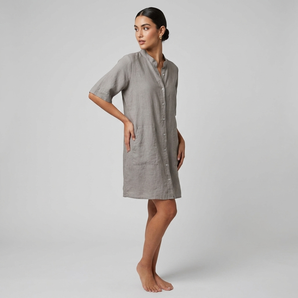 Grey shirt dress with button front, relaxed midi fit, and side pockets