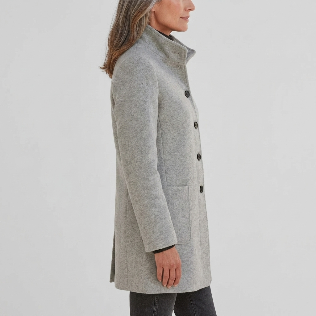 Women's mid-length wool blend coat with stand collar, button front, patch pockets, light gray side