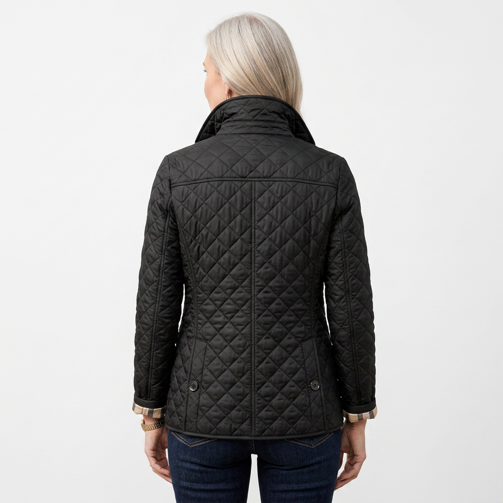 Women's black quilted jacket, back view with diamond stitching and stand collar