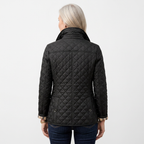 Women's black quilted jacket, back view with diamond stitching and stand collar
