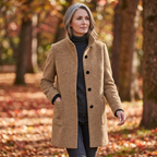 Women’s stand-collar winter coat in tan fleece, button front and side pockets