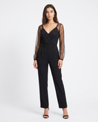 Black V-neck jumpsuit with sheer sleeves and belted waist, wide legs