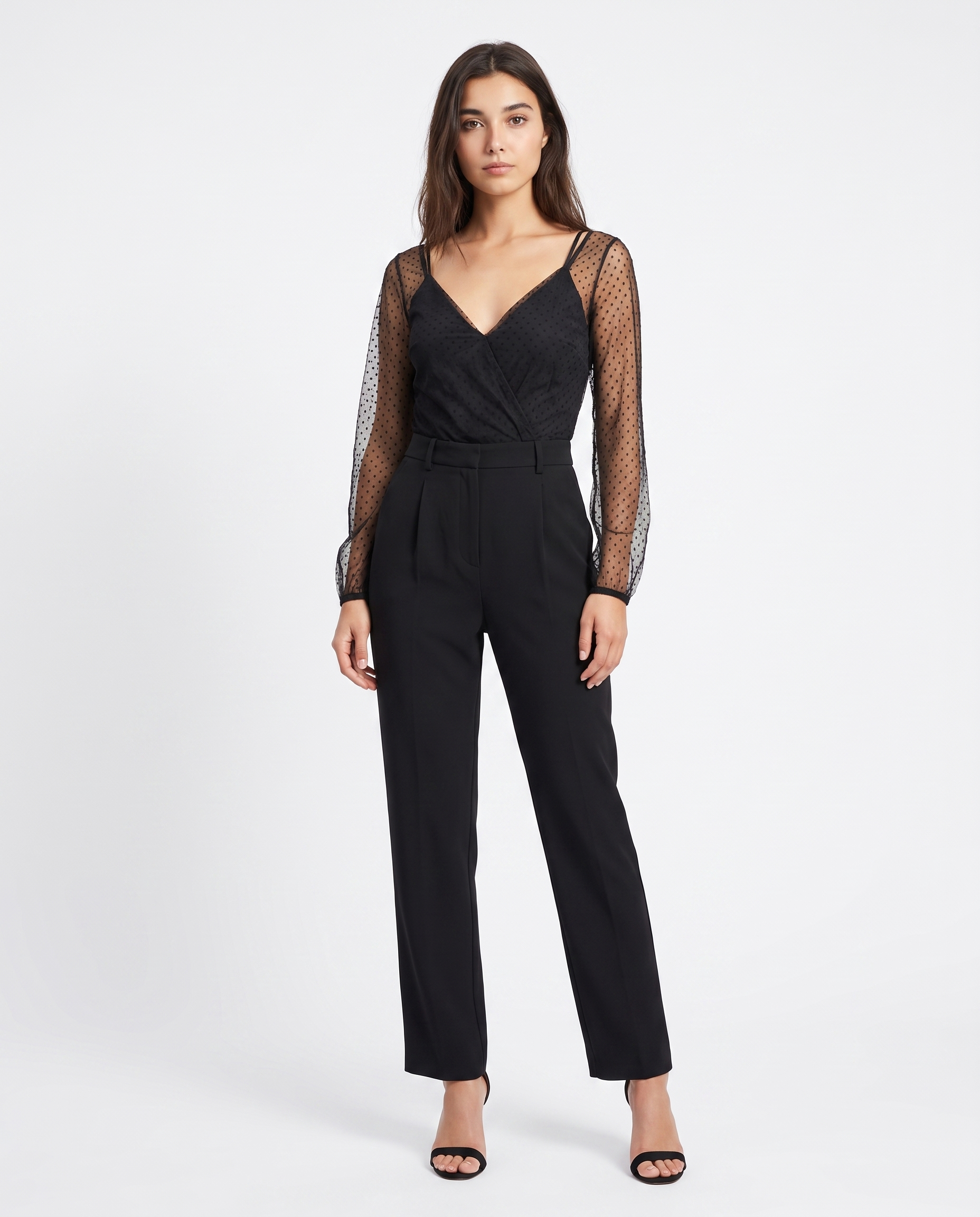 Black V-neck jumpsuit with sheer sleeves and belted waist, wide legs