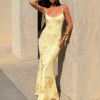 Yellow floral jacquard maxi dress with corset-style bodice and spaghetti straps