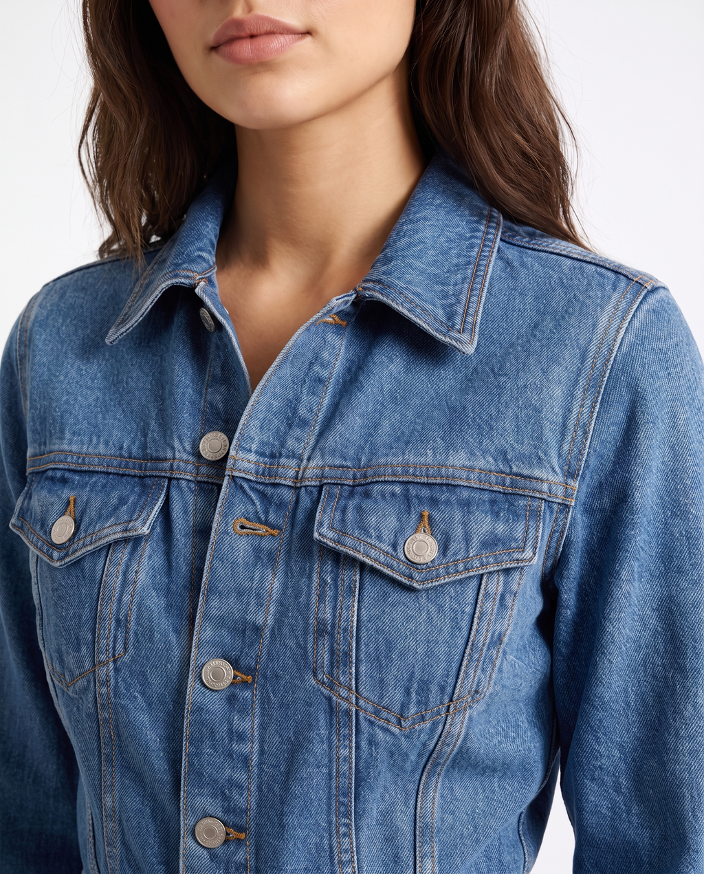 Blue denim jumpsuit top with pointed collar, button placket, chest flap pockets