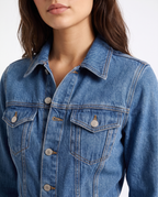 Blue denim jumpsuit top with pointed collar, button placket, chest flap pockets