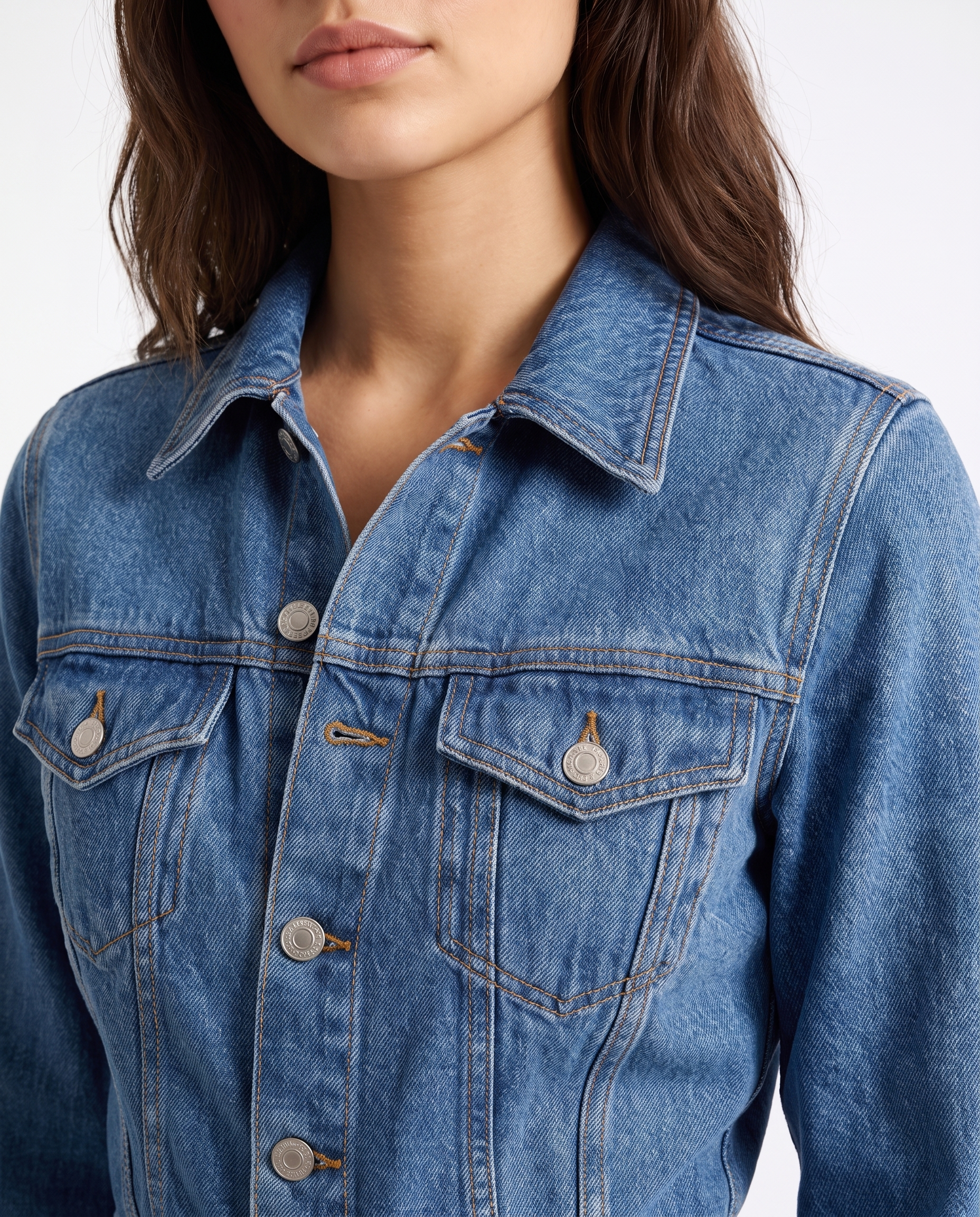 Blue denim jumpsuit top with pointed collar, button placket, chest flap pockets