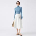 Women’s ribbed turtleneck sweater, light blue, long sleeves, slim fit; paired outfit.