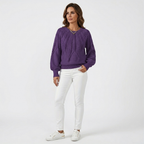 Women's dark purple cable knit sweater pullover with textured yoke and voluminous sleeves.