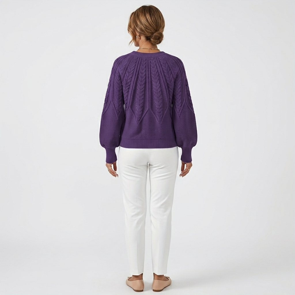 Women's dark purple cable knit pullover sweater, back view with textured stitch pattern.