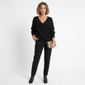 Black cashmere V-neck knit pullover with balloon sleeves and ribbed cuffs