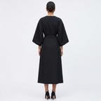 Black satin kimono sleeve wrap midi dress, back view with waist belt