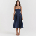 Navy blue A-line dress with sweetheart bodice, spaghetti straps, pleated midi skirt