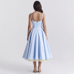 Women's blue bustier midi dress, back view, layered tulle high-low skirt