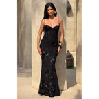 Black floral jacquard maxi dress, front view with corset bodice, spaghetti straps