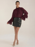 Burgundy sheer high mock neck top with tiered ruffle sleeves