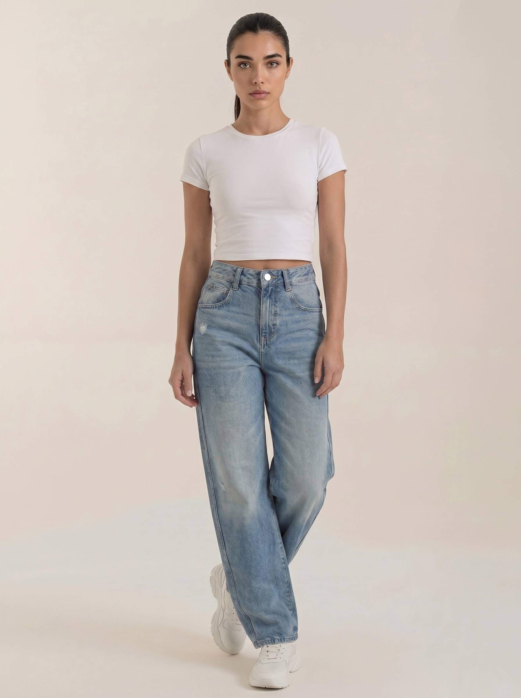 Medium-wash blue wide-leg jeans with button fly and front pockets