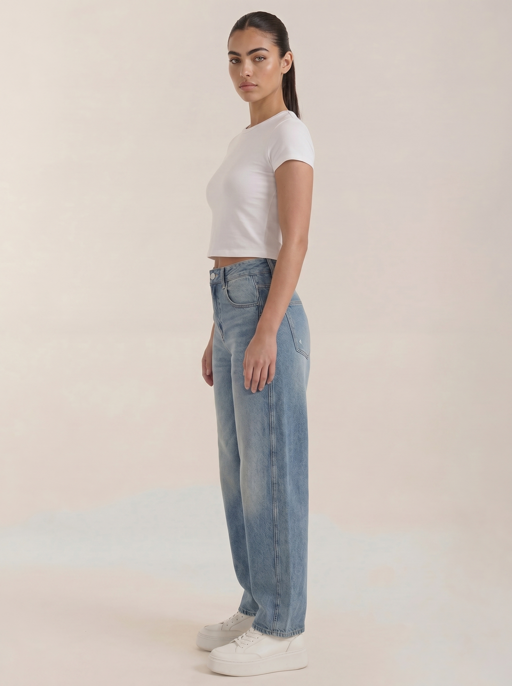 Light blue wide-leg jeans with relaxed fit and button fly