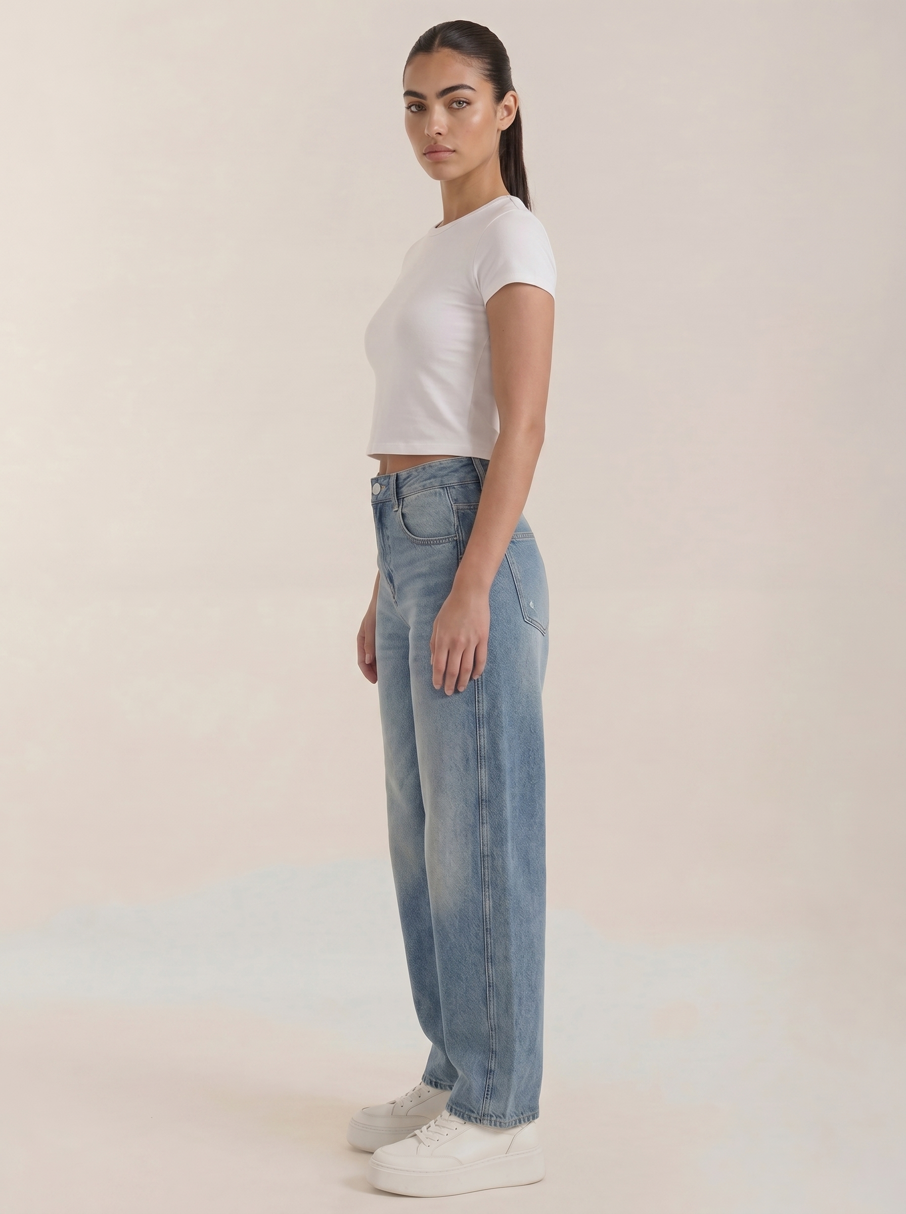 Light blue wide-leg jeans with relaxed fit and button fly