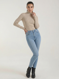 Women's cotton mock neck top, beige long-sleeve knit with hand near collar