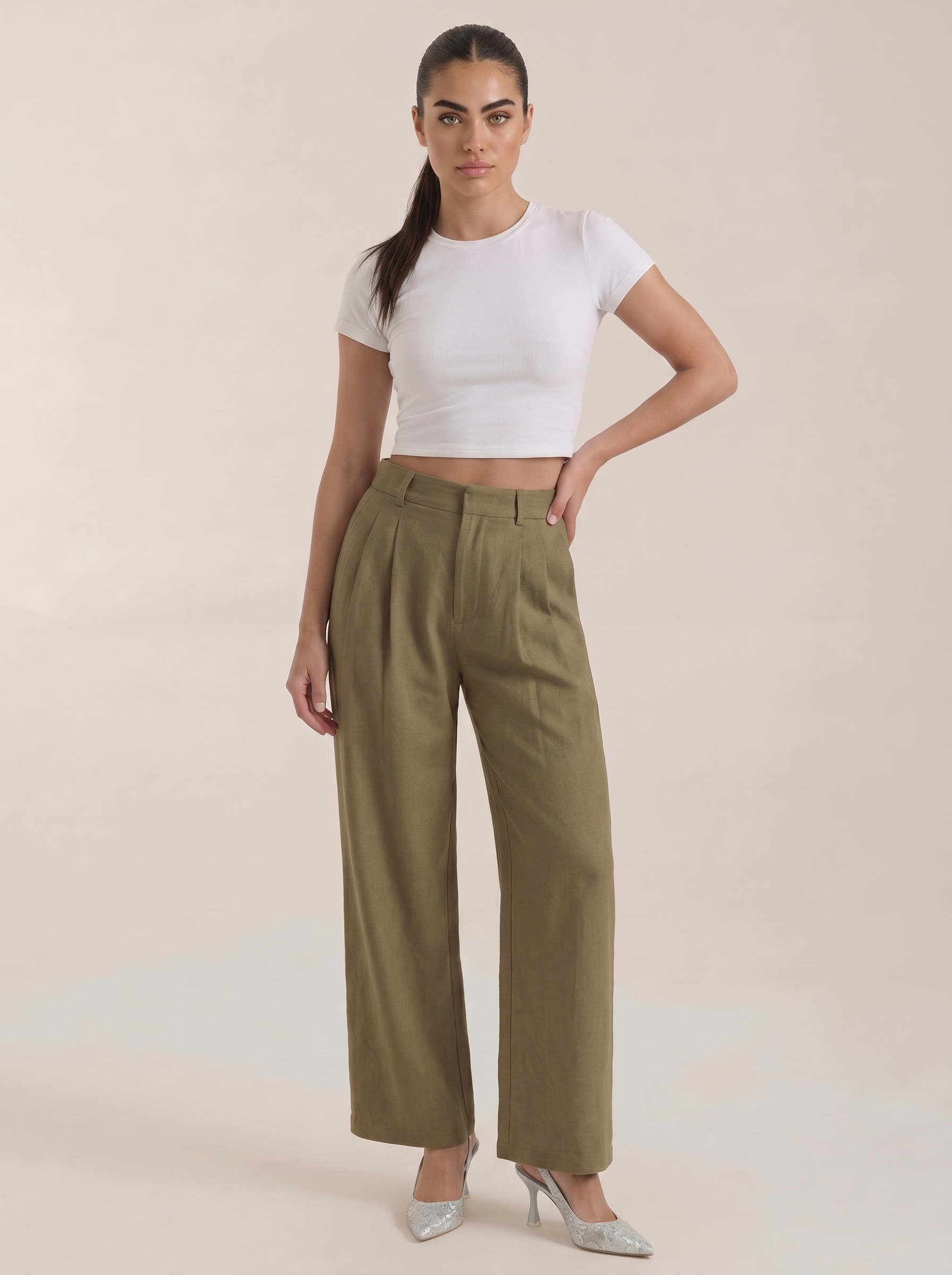 Pleated high-rise wide-leg pants in dark green, with pleated front and wide leg fit