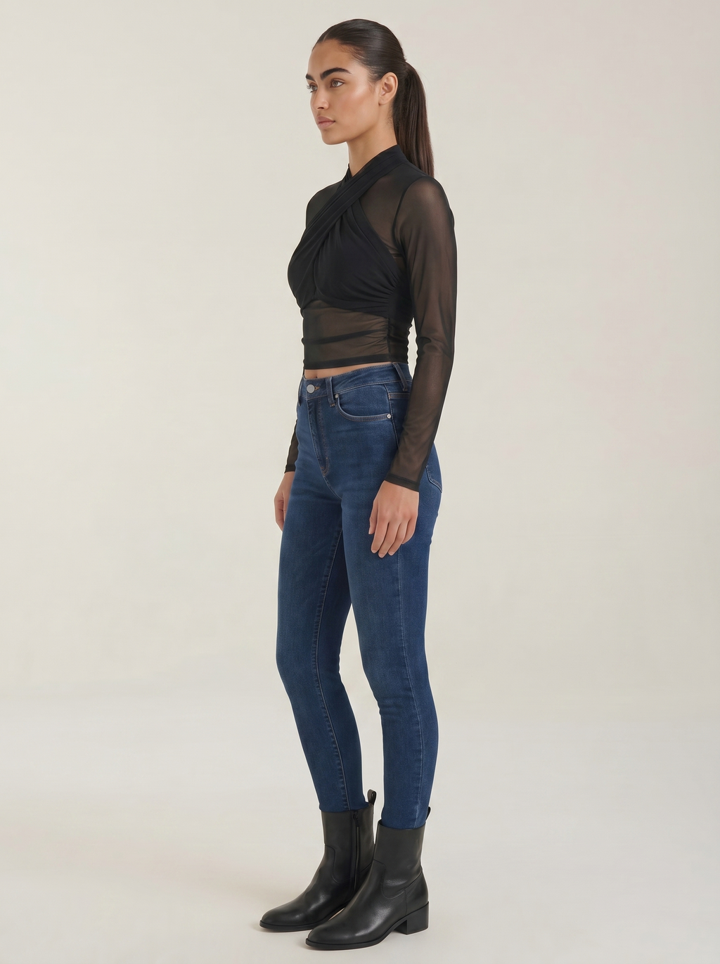 Sheer wrap mesh top in dark black with draped cross front and sheer long sleeves