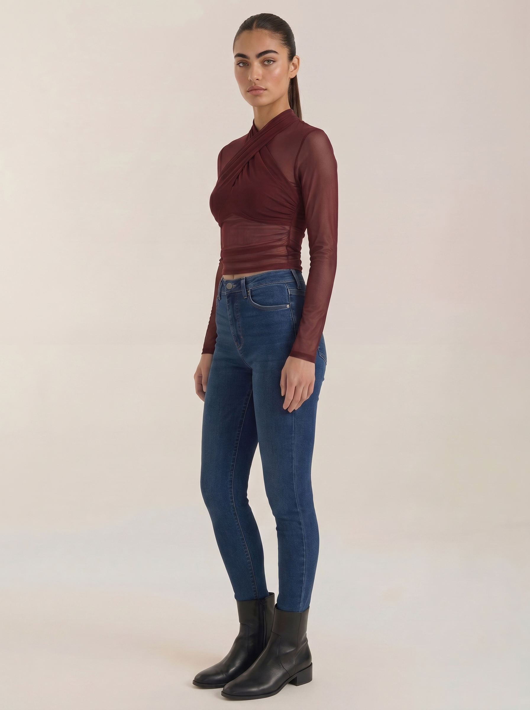 Sheer wrap mesh top in burgundy with draped wrap neckline and sheer long sleeves