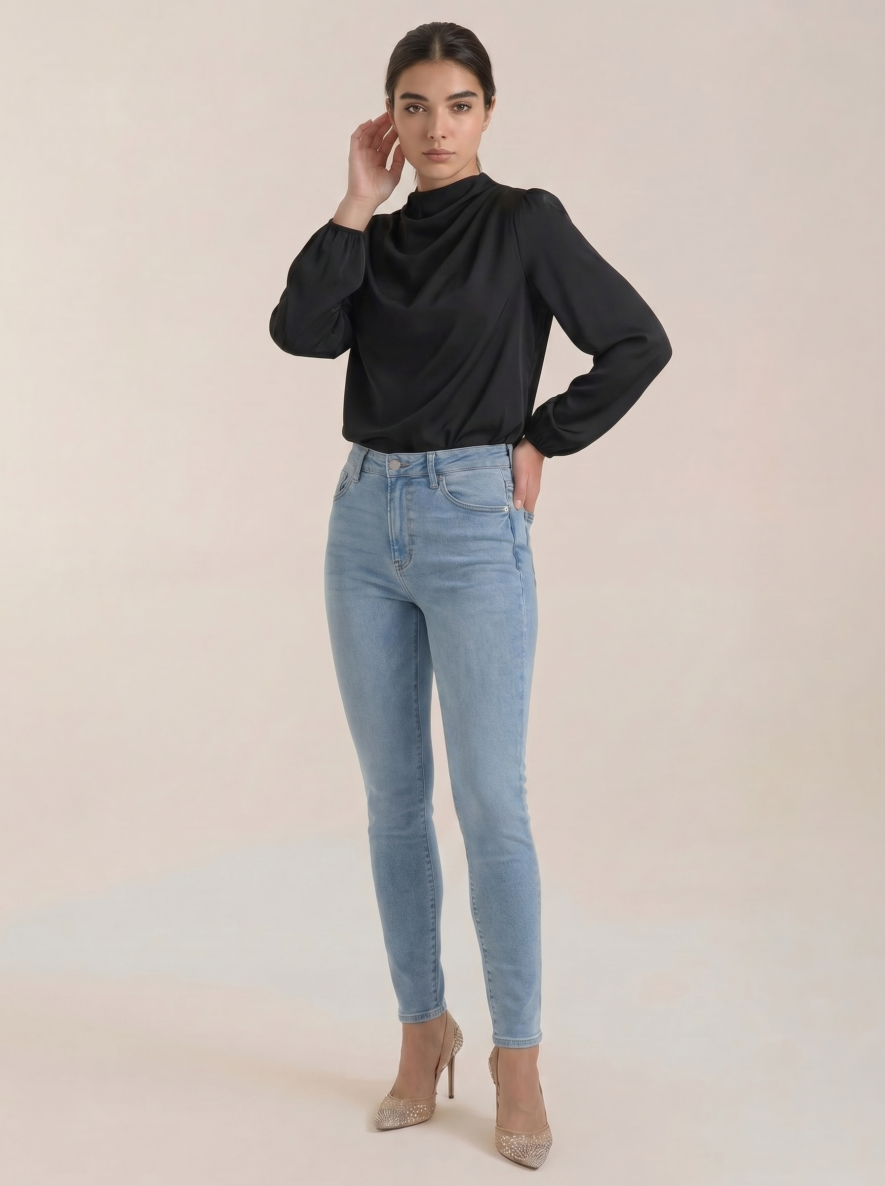Black draped long-sleeve blouse with cowl neck and balloon sleeves