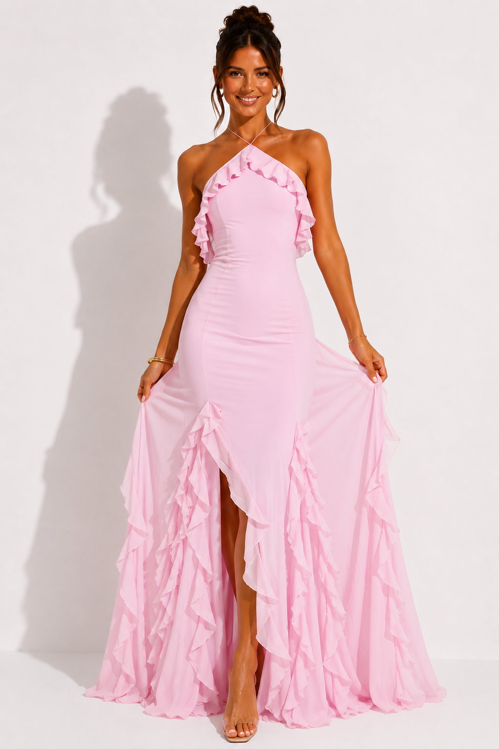 Pink halter-neck maxi dress with layered ruffle skirt and ruffled halter neckline