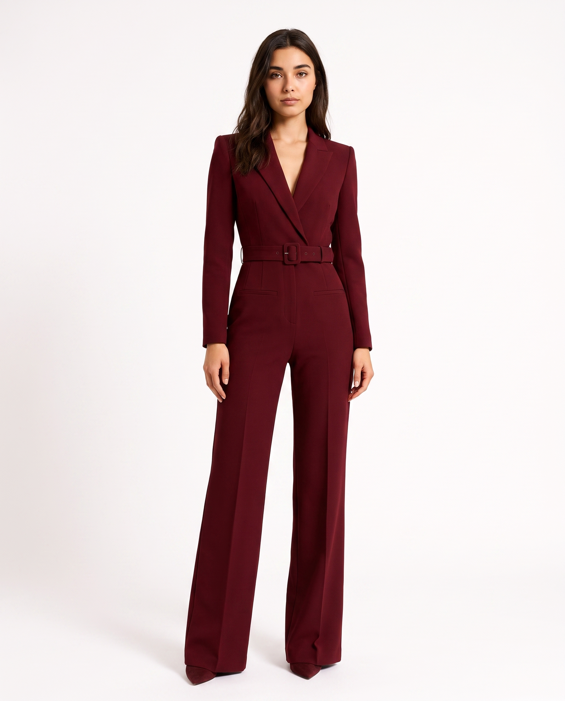 Burgundy V-neck blazer jumpsuit with waist belt and wide-leg trousers