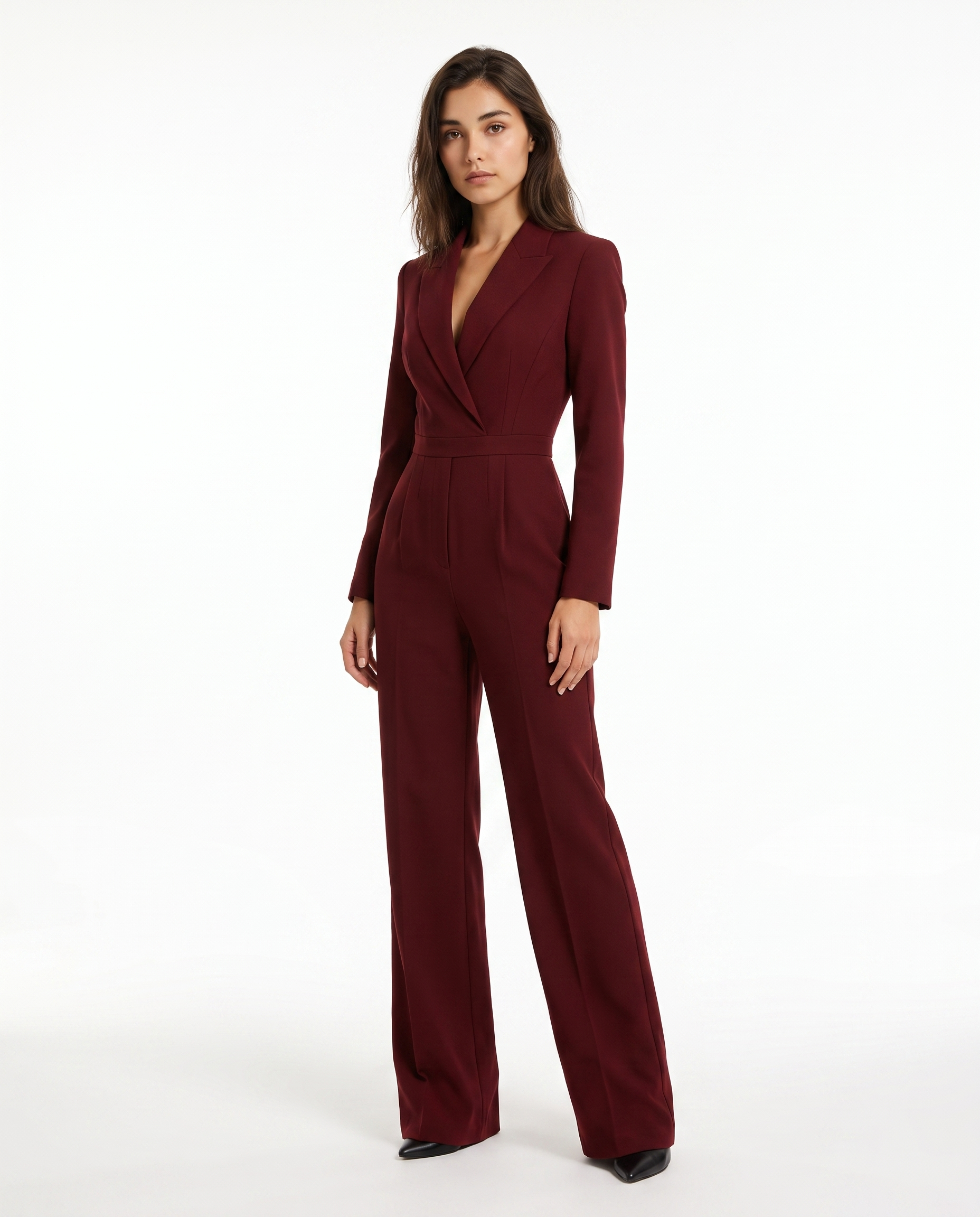 Burgundy V-neck blazer jumpsuit with belted waist and wide-leg legs