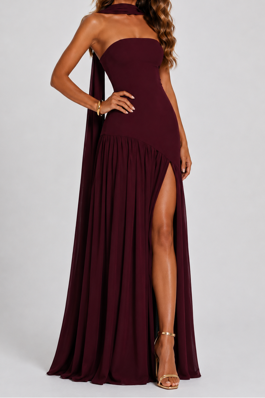Burgundy strapless maxi dress with pleated skirt and high side slit, front view