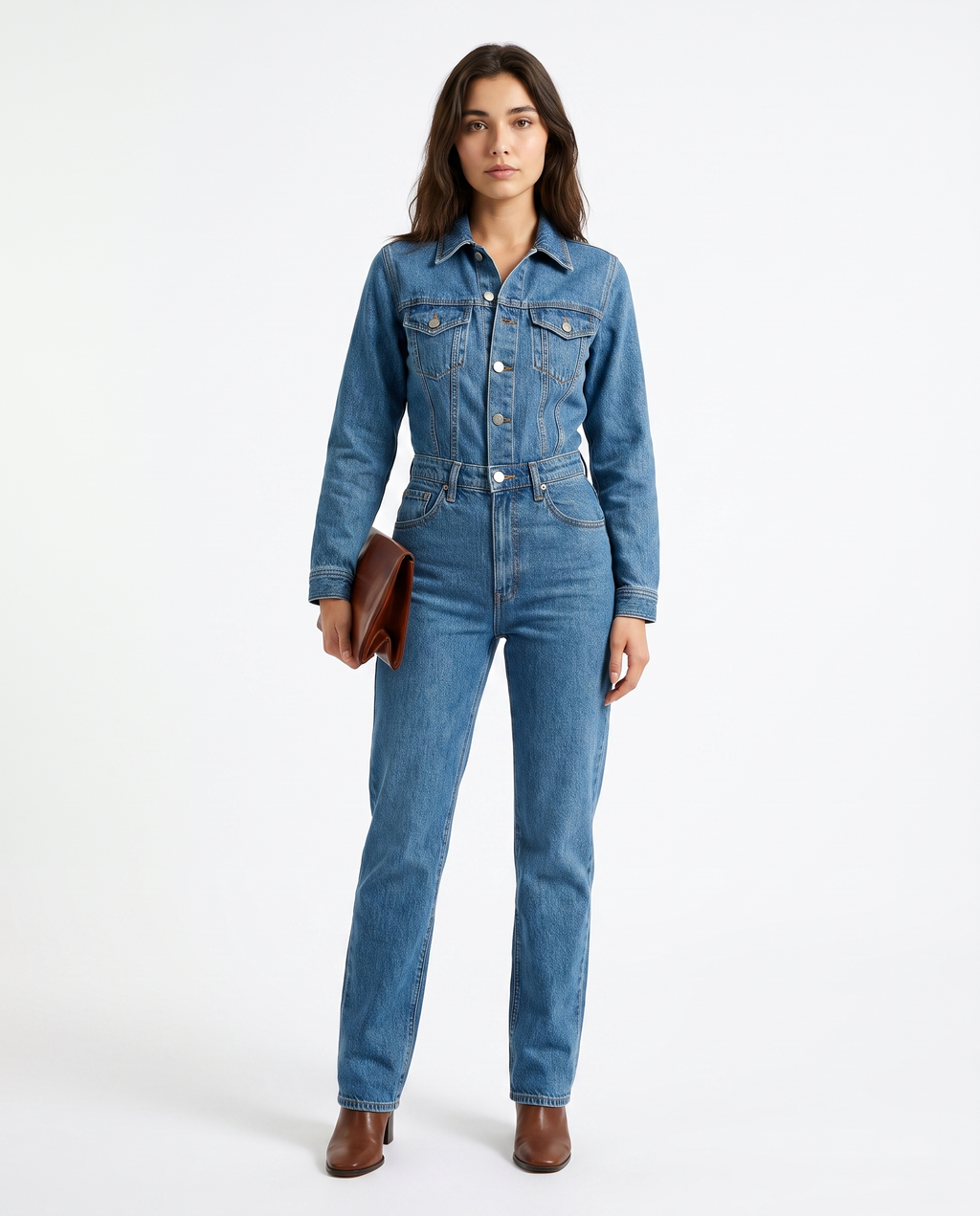 Women's blue denim jumpsuit with button-front, belted waist, chest flap pockets