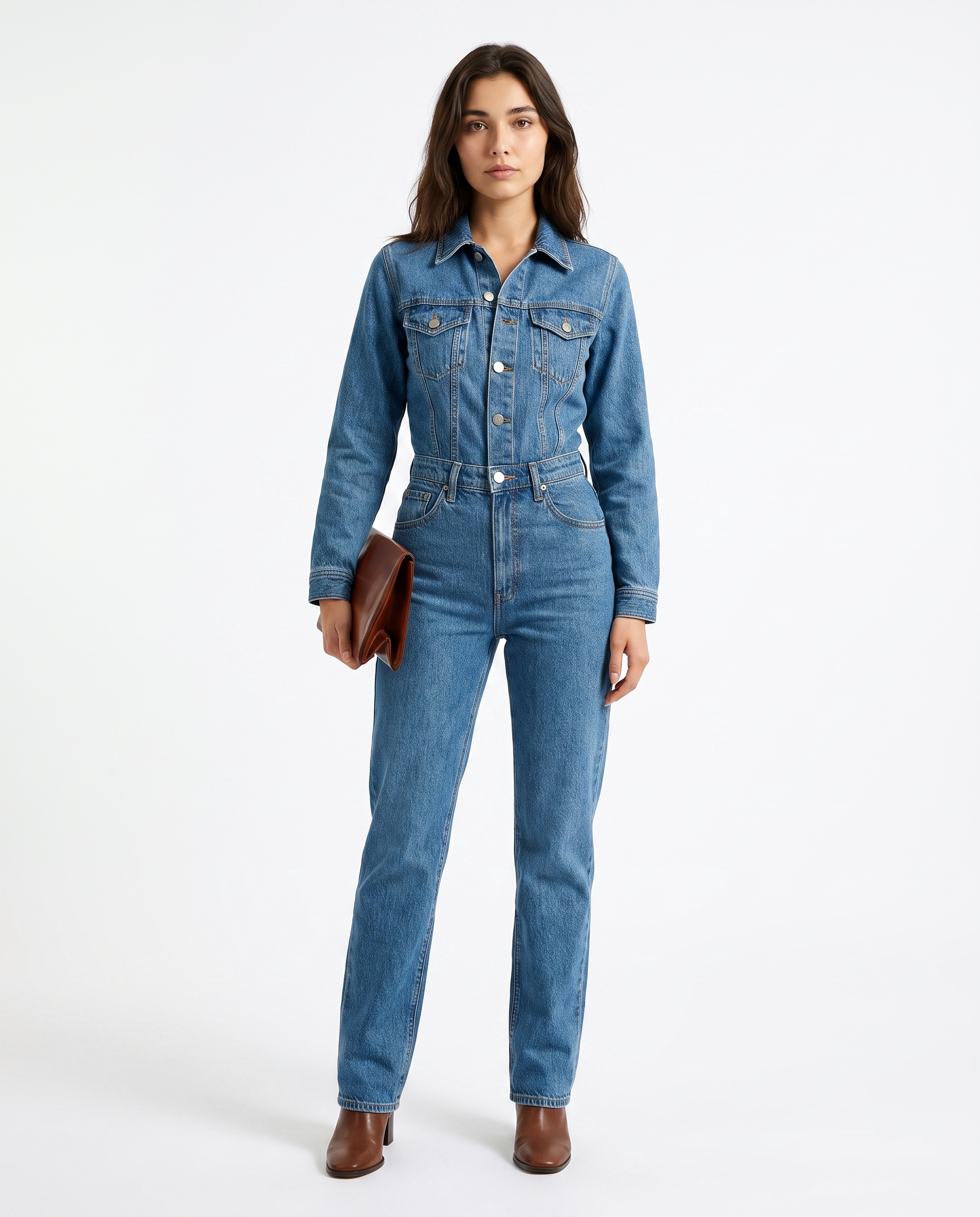 Women's blue denim jumpsuit with button-front, belted waist, chest flap pockets