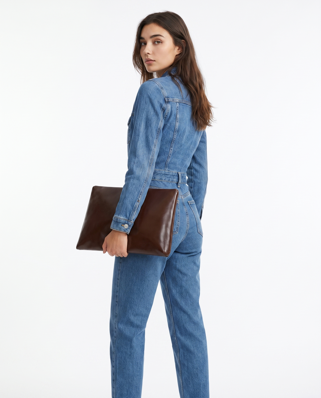 Women's blue denim jumpsuit with side seam pockets, button cuffs, straight leg fit