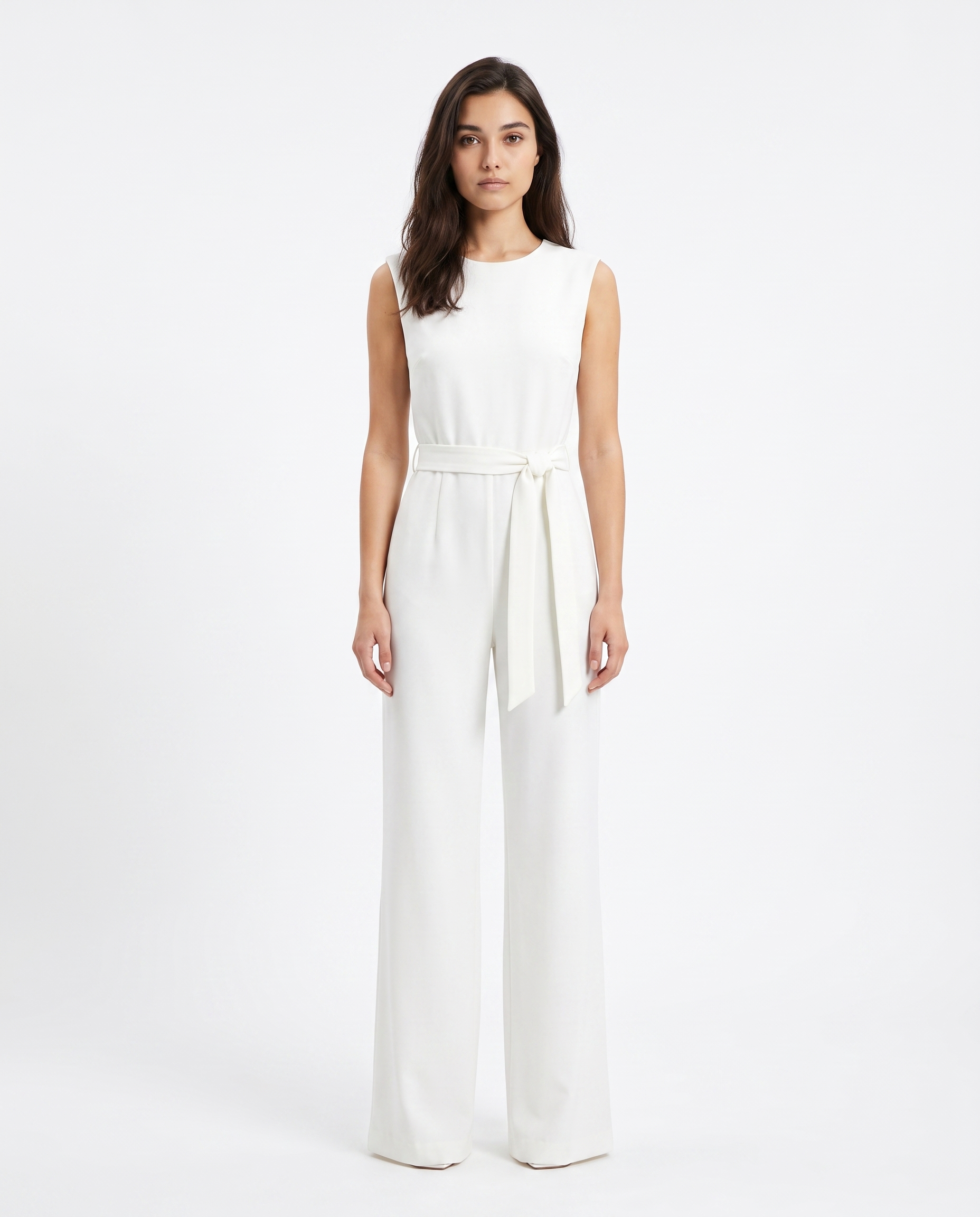 White sleeveless wide-leg jumpsuit with tie-waist sash and high neckline